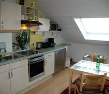 K&uuml;chenzeile und Esstisch in Ferienwohnung Hoppe Warburg